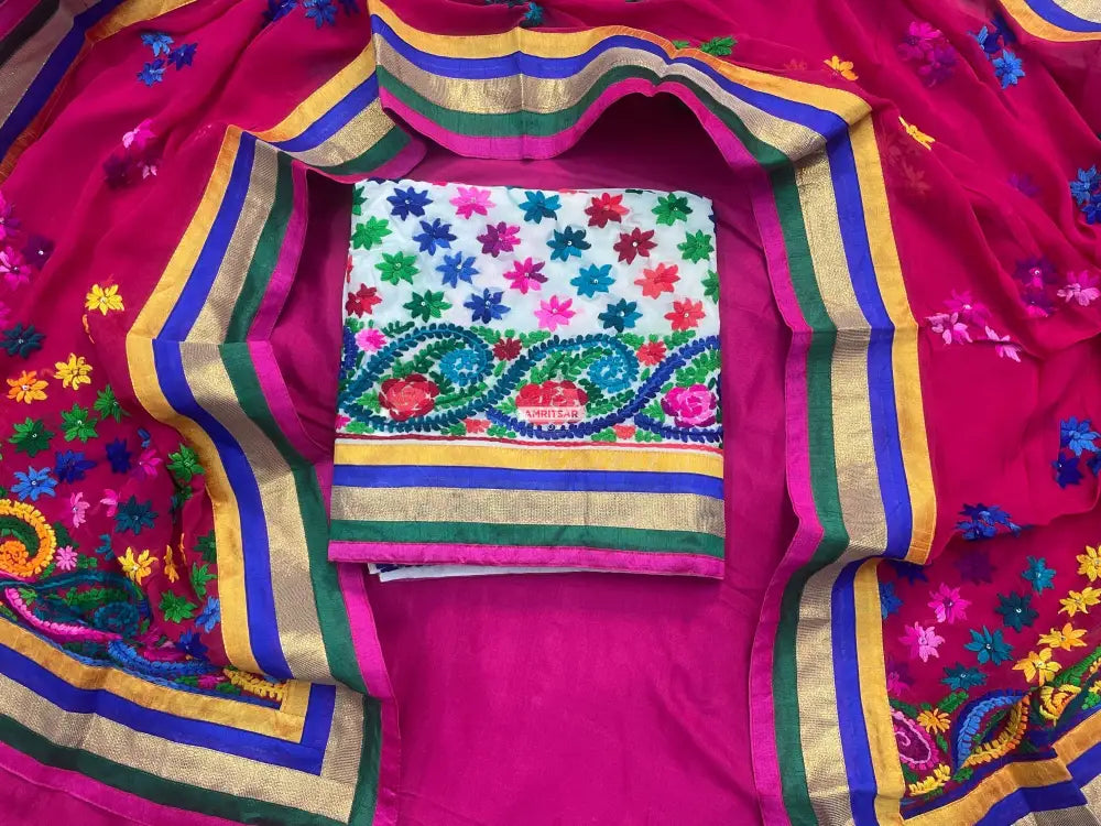 The Amritsar Store handcrafted Phulkari suit with vibrant traditional embroidery, unstitched Punjabi ethnic wear with dupatta for women