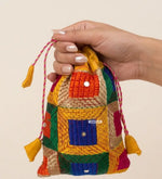 Traditional Punjabi multicolor Phulkari embroidered potli bag for women by The Amritsar Store.