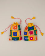 Traditional Punjabi multicolor Phulkari embroidered potli bag for women by The Amritsar Store.