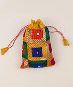 Traditional Punjabi multicolor Phulkari embroidered potli bag for women by The Amritsar Store.