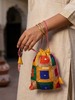 Traditional Punjabi multicolor Phulkari embroidered potli bag for women by The Amritsar Store.