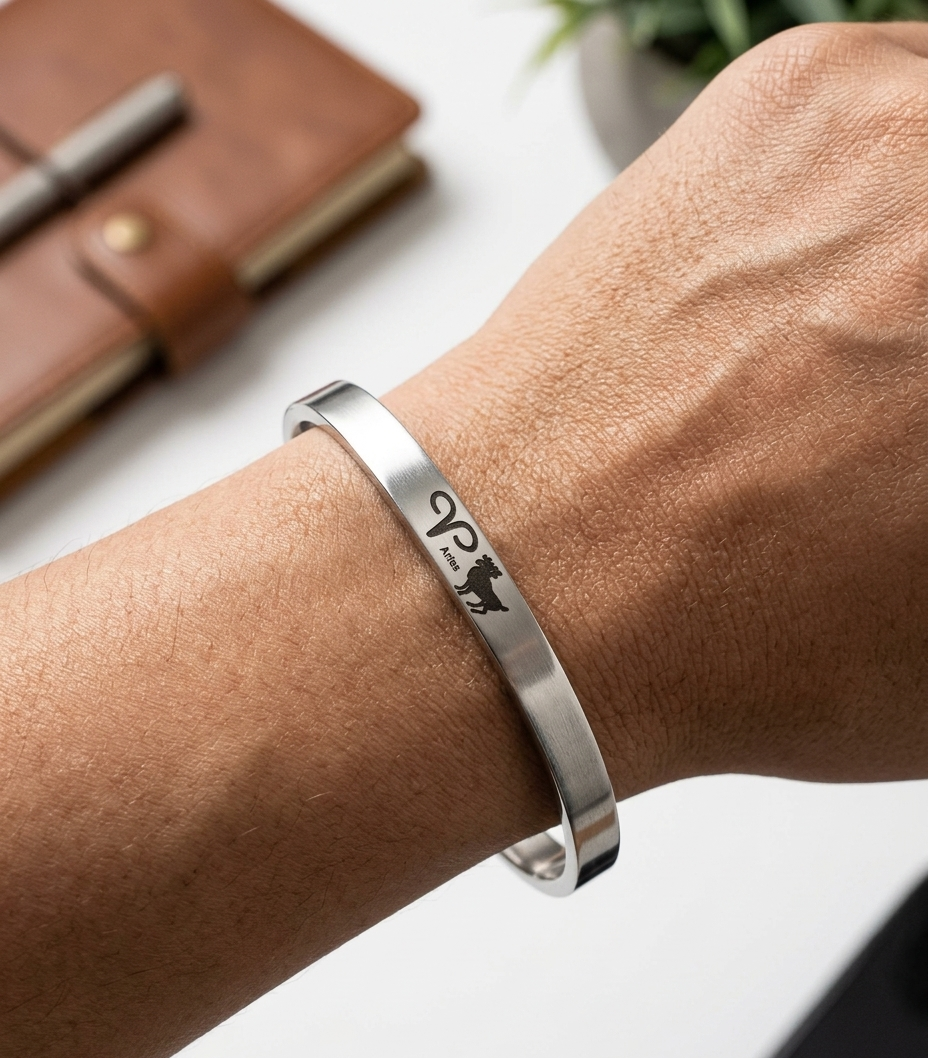 Stainless Steel Sun Sign Unisex Punjabi Kada with engraved zodiac symbol by The Amritsar Store, sleek silver finish bracelet for men and women