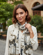 Vintage Hollywood print scarf in beige and sepia tones featuring classic cinema-inspired artwork by The Amritsar Store