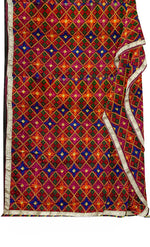Rangoli Charm Phulkarireflects the vibrant magenta base and multicolor embroidery, reminiscent of a traditional rangoli design, full of color and cultural richness.