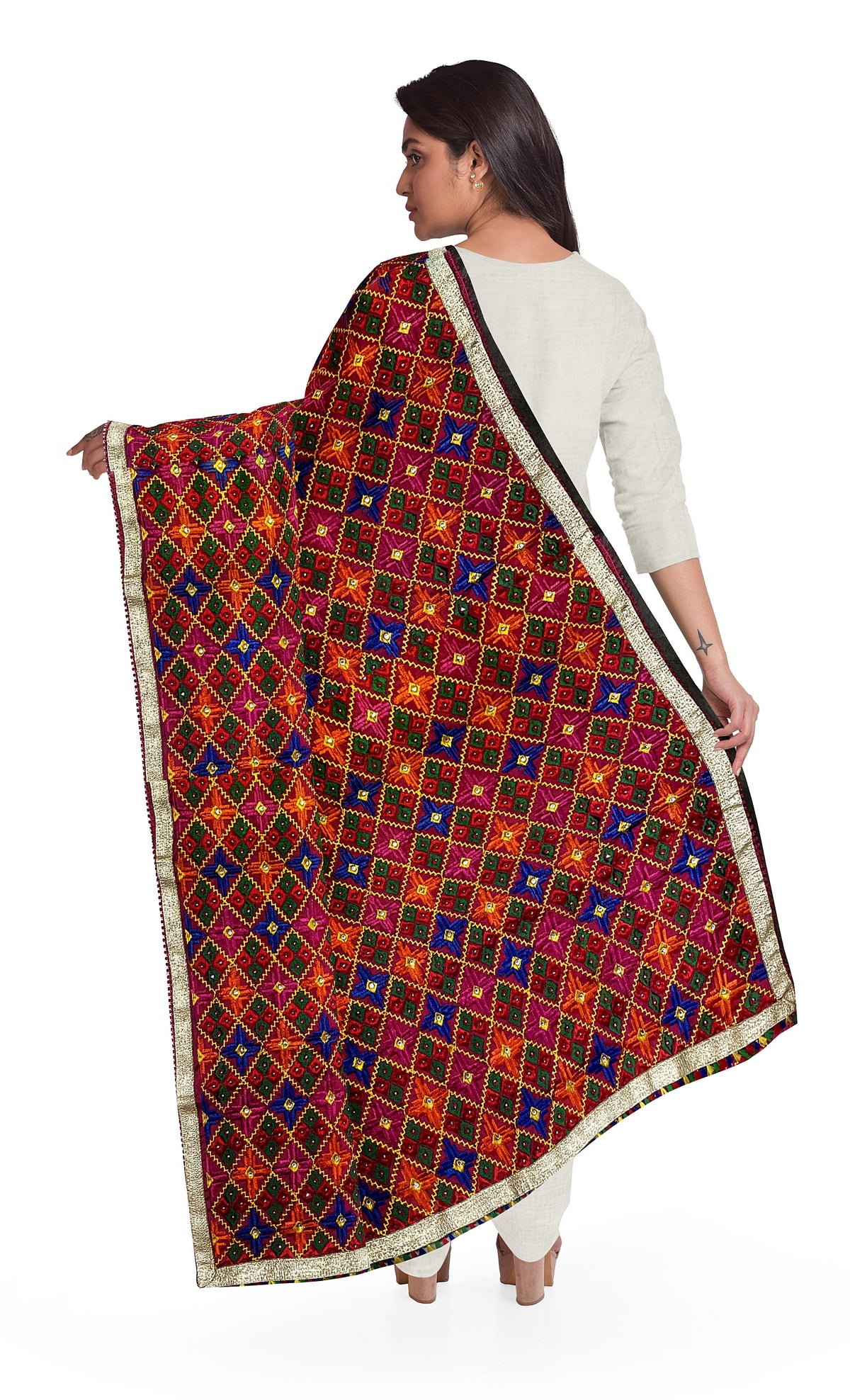 Rangoli Charm Phulkari reflects the vibrant magenta base and multicolor embroidery, reminiscent of a traditional rangoli design, full of color and cultural richness.