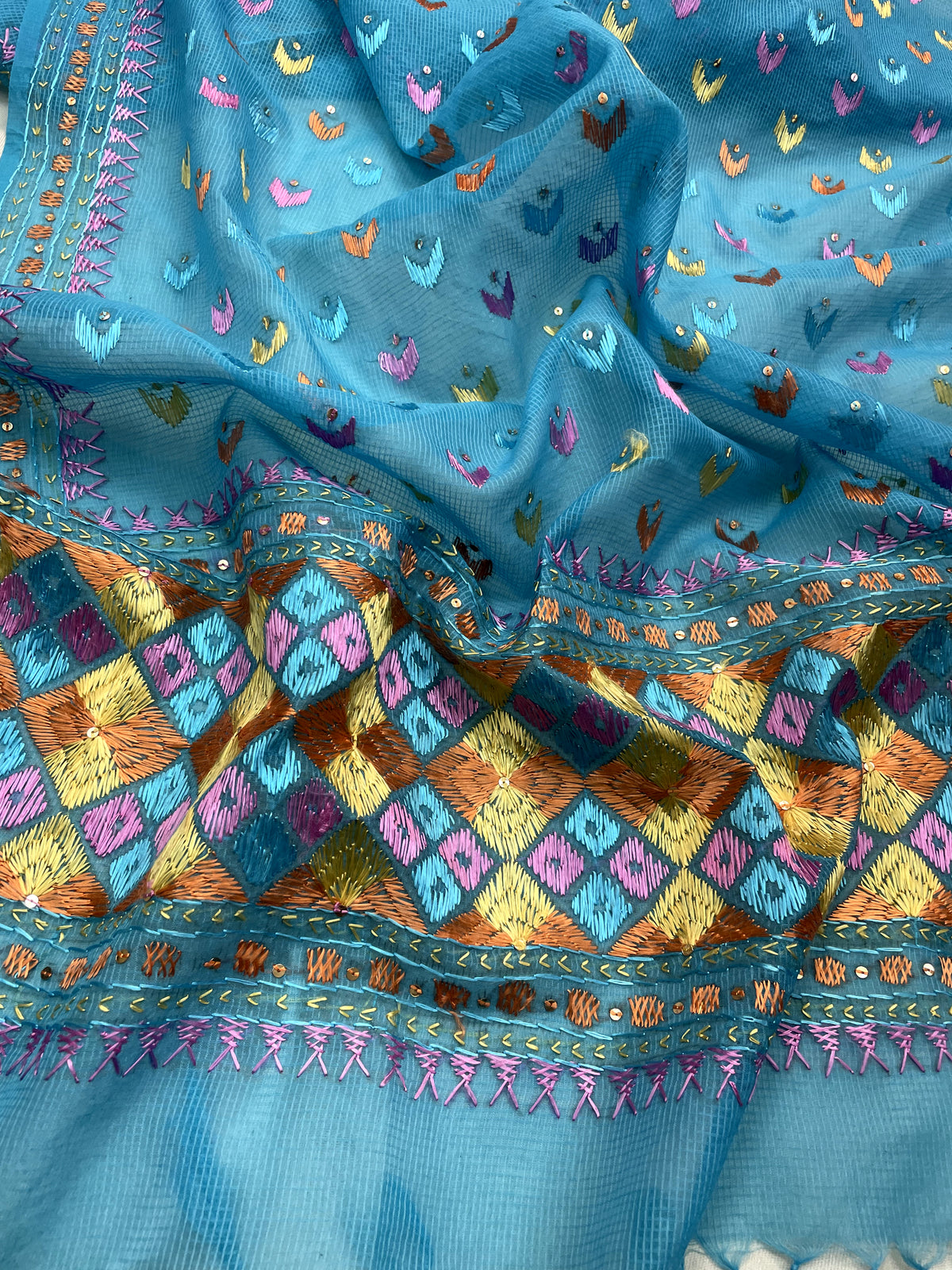 Hand embroidered blue Phulkari dupatta for women with traditional Punjabi floral embroidery and elegant ethnic design.