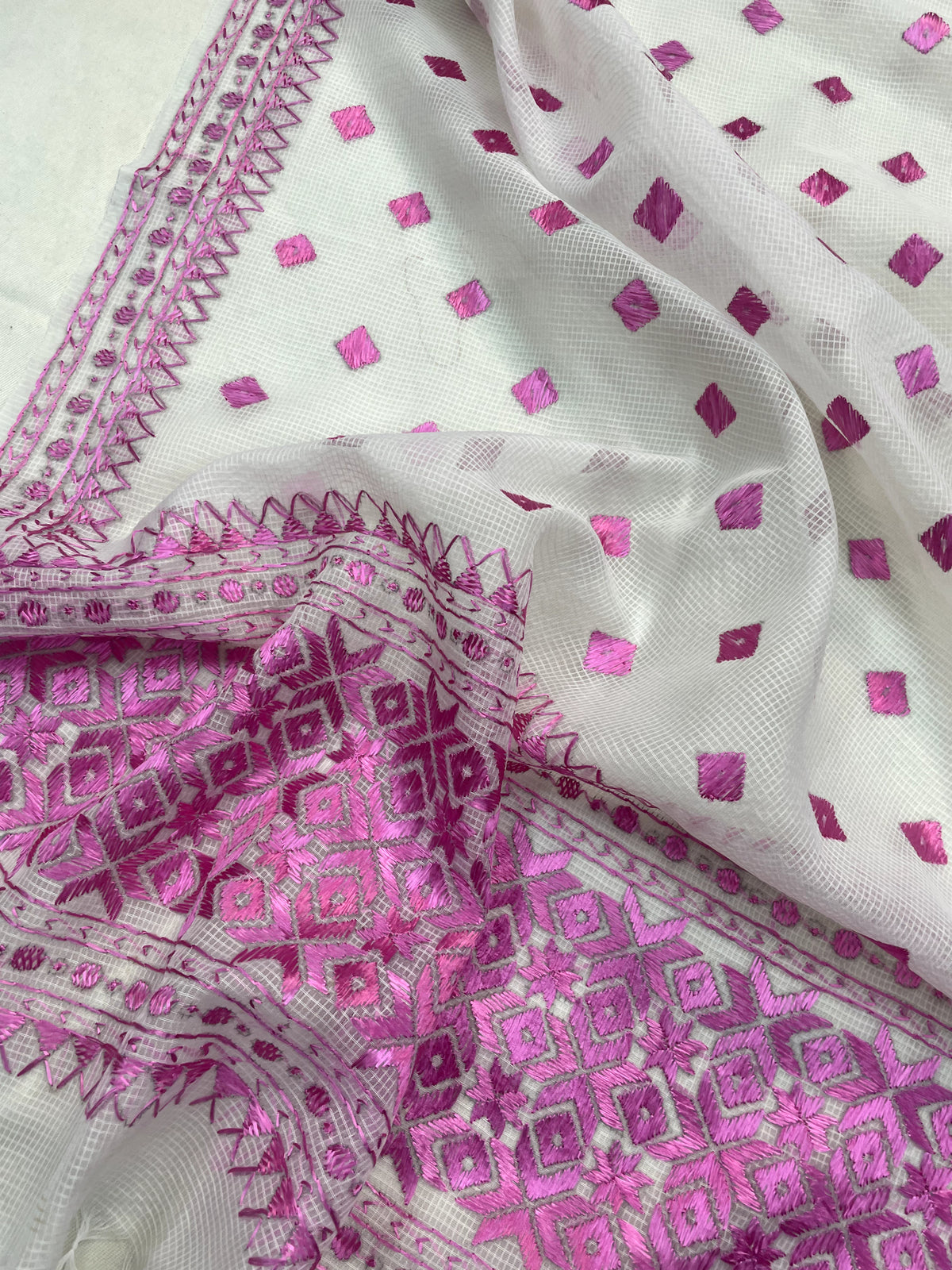 Hand embroidered Phulkari dupatta in off white with pink threadwork and traditional Punjabi design