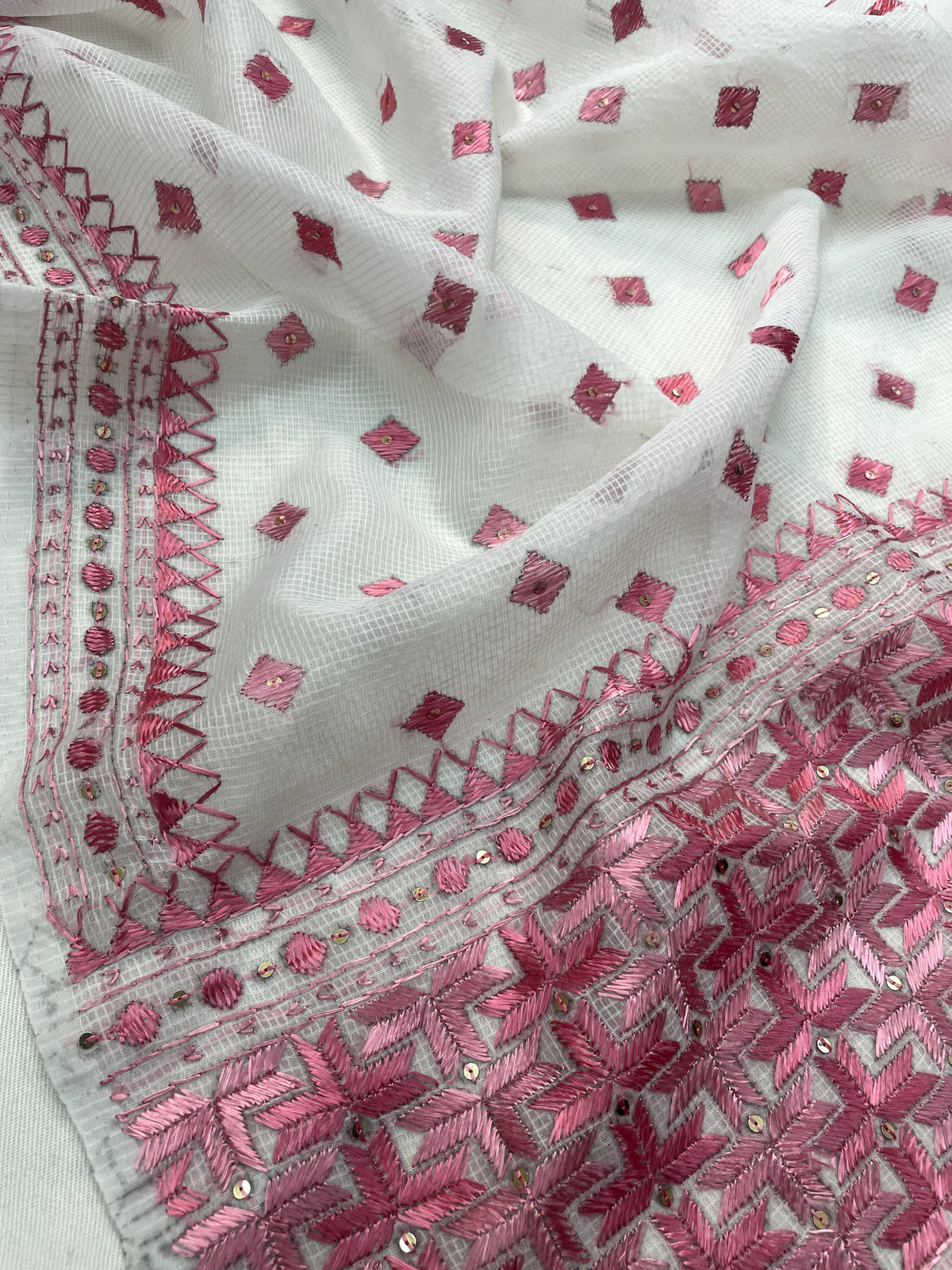 Hand embroidered white & pink Phulkari dupatta for women in soft traditional Punjabi ethnic style.