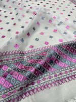 Hand embroidered white Phulkari dupatta with pink and grey Punjabi threadwork, traditional ethnic design and handcrafted detailing by The Amritsar Store