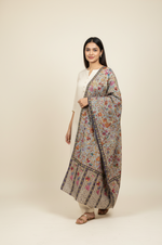Women's Kalamkari fine wool stole featuring traditional hand-inspired floral motifs in a soft designer wrap with elegant heritage craftsmanship.