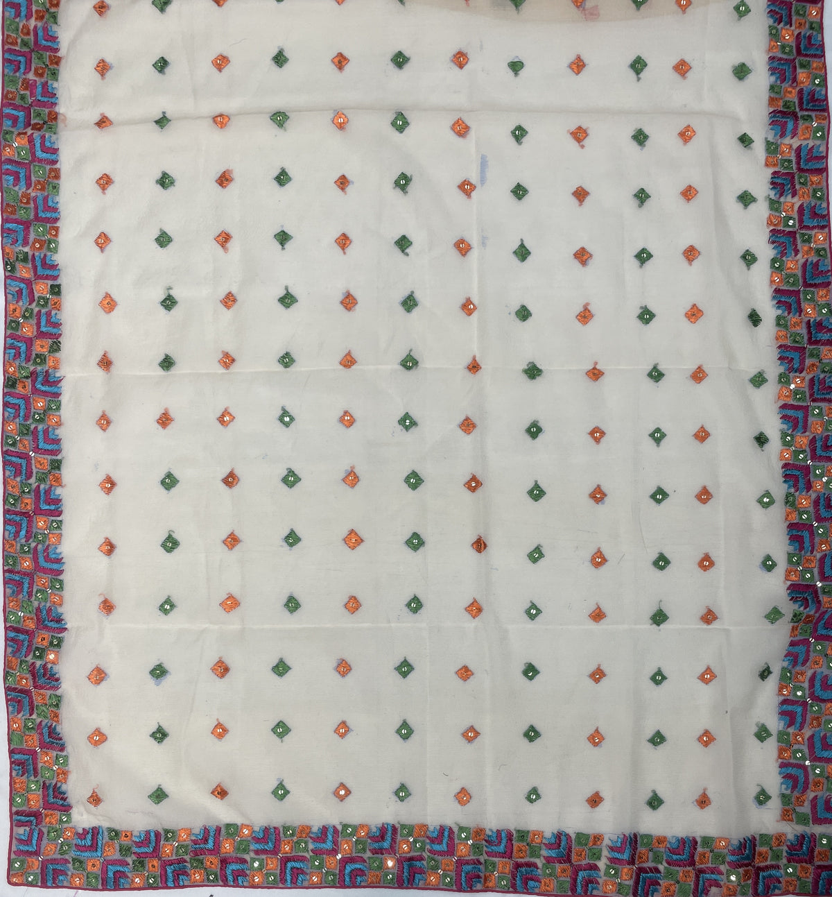 The Amritsar Store Phulkari Hand Embroidered Dupatta in cream color adorned with vibrant multicolor thread work, showcasing traditional Punjabi craftsmanship and elegance.